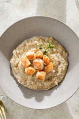 grilled scallops with quinoa and microgreens