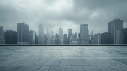 Obraz premium City skyline with towering buildings under a cloudy sky, contrasted by a vacant marble foreground, evoking a sense of stillness.