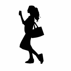 Silhouette of woman shopping