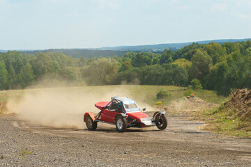 Autocross on a dirt track. rally race. Off-road racing. Training races of racing drivers. Modern...