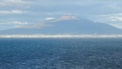 View to Vesuvius from the blue Mediterranean in autumn, October 24, 2017.