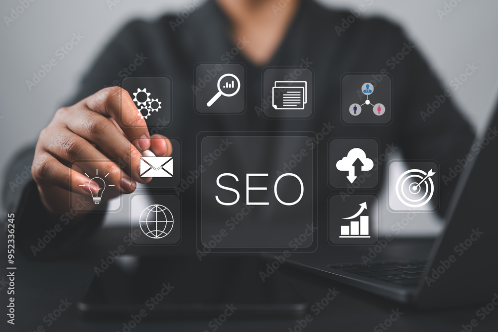 Leinwandbilder Businessman use laptop to analyze SEO search engine optimization for promoting ranking traffic on website and optimizing your website to rank in search engines.