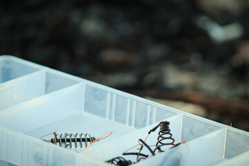 fishing equipment in a transparent organizer