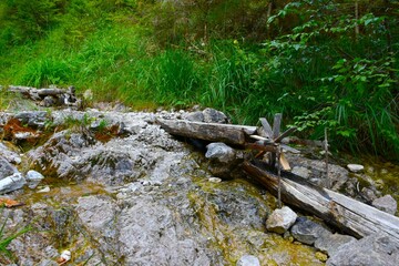 Small water wheel at a stream