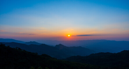 Obraz premium Dark landscape hills with sunset or sunrise. mountains at twilight