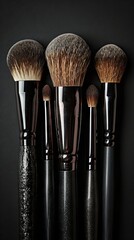 Various professional makeup brushes isolated on black background Cosmetics concept with copy space