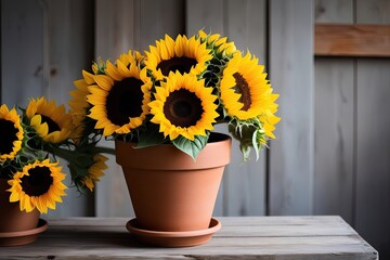 Obraz premium Rustic Summer Floral Arrangement with Sunflowers in Terracotta Pot