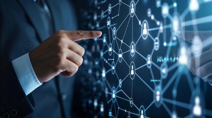 A man pointing at a computer screen with a network of people on it