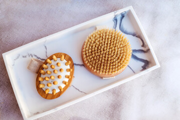 Wooden brush for anti-cellulite body massage at home . Body care at home