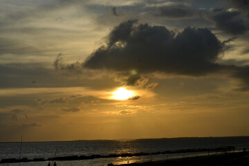 sunset over the sea, the beauty sunset, Sun in the Sky, beautiful eveing time view, Sunset on the beach of the Bangladesh.