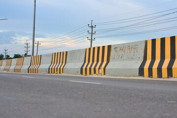 Road on Barricades construction site, Replacement of curbs along the road and electric wire.