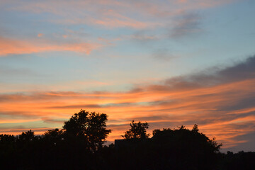 sunset over the forest trees, the beauty sunset, Sun in the Sky, beautiful eveing time view, dark black sunset silhouette.