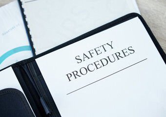 Documents, work safety and procedures with policy for emergency guidelines, health or compliance closeup. Paper, protection and rules on desk for instruction, security report or accident prevention