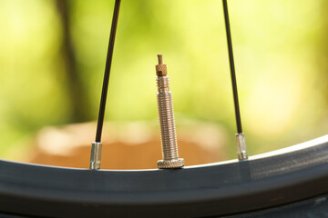 Presta valve on a bike wheel close up