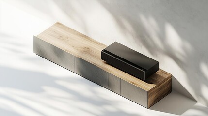 A modern wooden console with a sleek black box on top, emphasizing minimalist design.