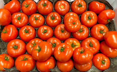 Red plump ripe fresh tomatoes at a Mediterranean market