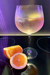 A refreshing cocktail with sliced orange and lemon citrus fruit with ice