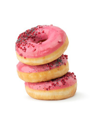 Hill of pink donates on a white isolated background