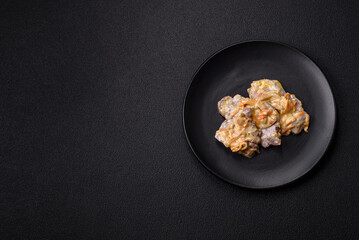 Delicious boiled beef or pork tongue sliced with carrots, onions, sour cream