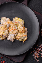 Delicious boiled beef or pork tongue sliced with carrots, onions, sour cream