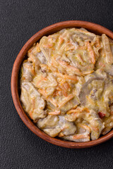 Delicious boiled beef or pork tongue sliced with carrots, onions, sour cream