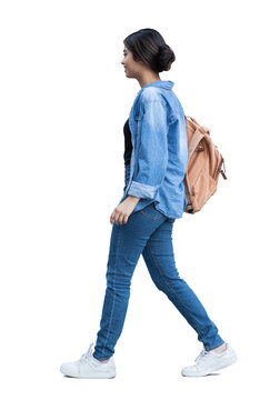 Full length portrait of a young woman walking isolated transparent PNG,  student girl full body photo PNG with transparent background precisely cut out with clipping path.