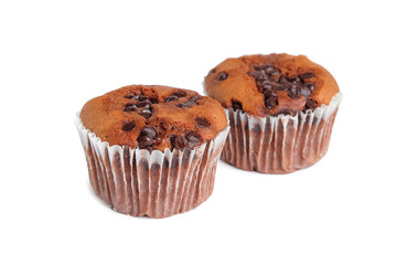 Banana cupcake topping with chocolate chip on white.