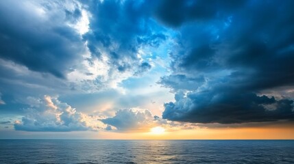 Obraz premium Dramatic storm clouds gathering over the ocean intense weather