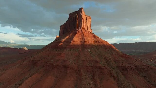Aerial imagery above Moab desert scene with rocky outcrops and Mesa in 4K
