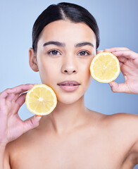 Girl, lemon and portrait in studio for skincare, organic and natural cosmetic with citrus acid or...