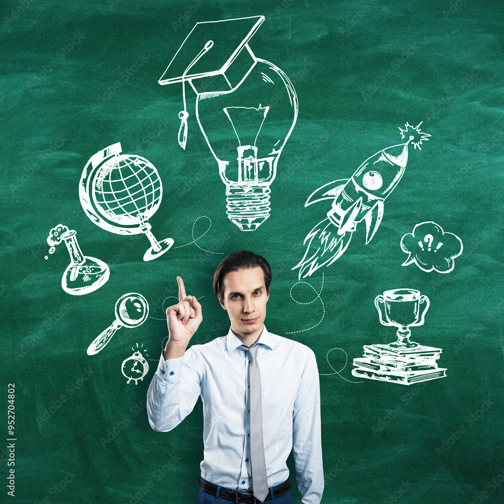 Poster young businessman pointing up with various education-related sketches on green chalkboard background