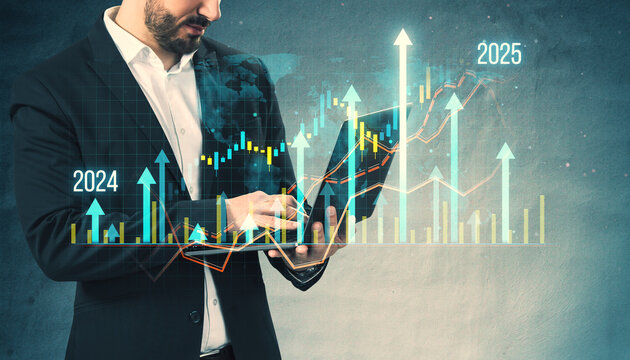 Businessman interacting with upward growing financial charts on a digital screen.