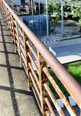 Rust of metals on Iron railing or Handrail. Corrosion of metal. Rust and corrosion in the weld. Corrosive Rust on old iron, grunge rust texture.