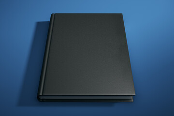 Blank hardcover book mockup on a blue background. 3D Rendering