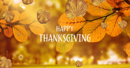 Image of happy thanksgiving text over autumn leaves