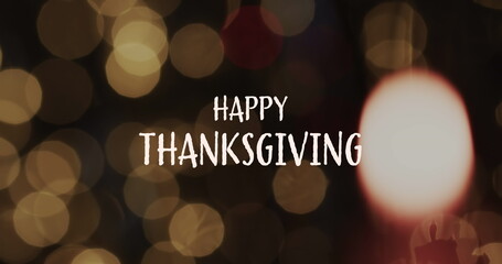 Image of happy thanksgiving text and spot lights on brown background