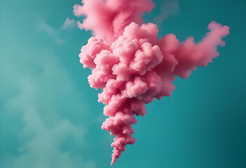 A dense pink smoke cloud billowing dramatically against a contrasting turquoise background, creating a striking abstract visual effect.
