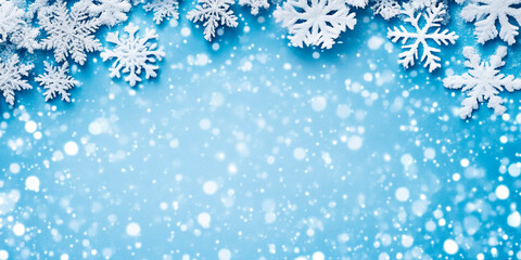 A winter-themed background featuring blue and white snowflakes on a light, frosty backdrop, with ample copy space. Ideal for holiday promotions, winter sales, and festive designs. Perfect for business