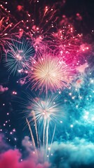 Fototapeta premium Vertical Colorful Fireworks Scene with Multiple Explosions Lighting Up the Twilight Sky