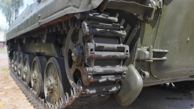 continuous tracks of a light Soviet reconnaissance tank from the Cold War