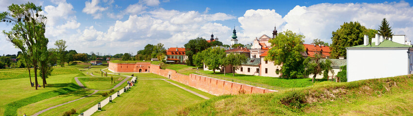 Naklejka premium Historical defensive fortifications in the historic center of Zamosc, panorama, banner. Poland