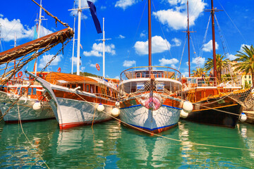 Coastal summer cityscape - view of the yachts moored in the port of Split, the Adriatic coast of...