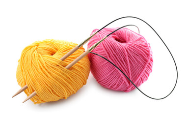 Two bright yarns and knitting needles isolated on white