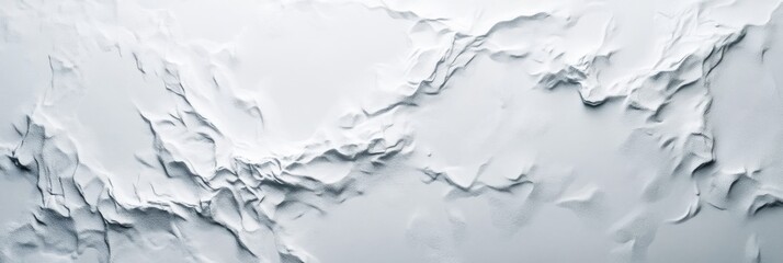 Fototapeta premium The composition highlights a textured white surface with an intricate irregular pattern, offering depth and a unique visual effect suitable for commercial design