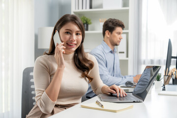 Smiling beautiful woman using phone call with searching customer list, looking at camera photo shooting portrait business pose profile with smart coworker at modern office at morning time. Postulate.