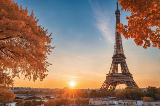 Eiffel tower silhouetted against vibrant sunset sky