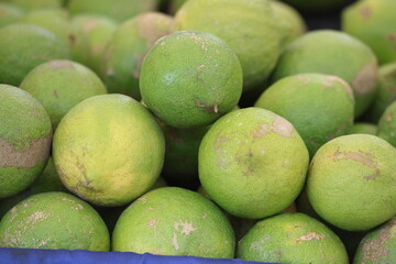 green lemons in the market