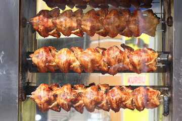 roasted whole chicken  in rotisserie 