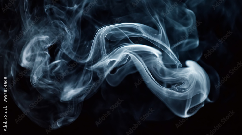 Wall mural Abstract smoke moving on a black background creating a textured visual perfect as a design element adding depth and fluid motion ideal for creative and artistic projects or atmospheric backdrops.