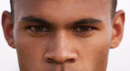 Obraz premium Face, man and eyes on portrait in outdoor for sport with fitness, training and exercise for competition. Closeup, male person and confident as athlete in Brazil for games or tournament and match